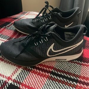 Used Woman’s running Nike shoes